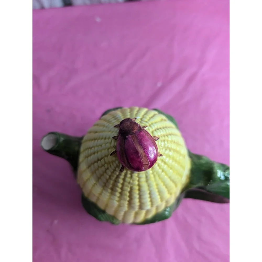 Corn husk teapot with lady bug beetle‎ ? at top  7.5